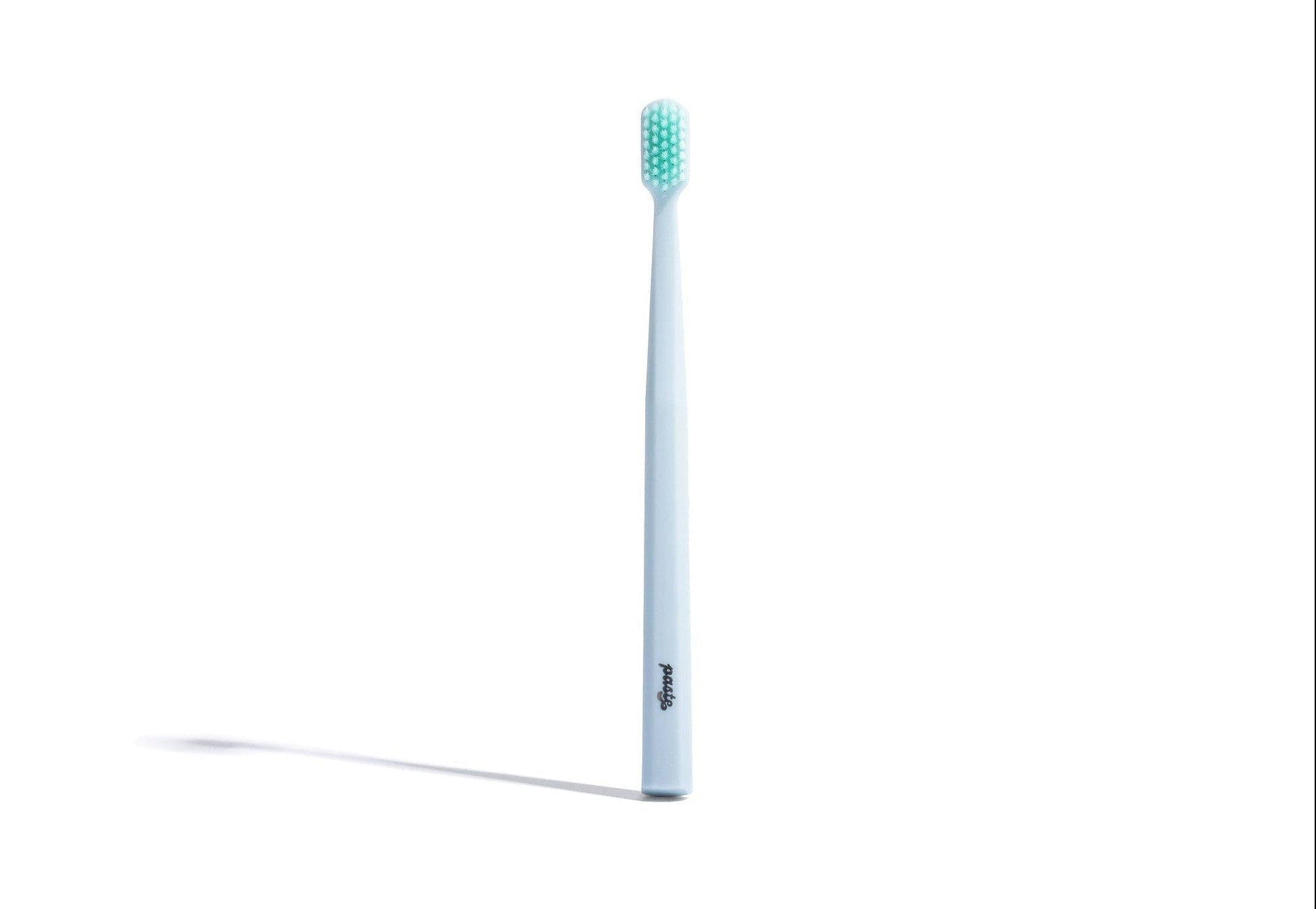 A toothbrush crafted with ultra-soft PBT (Polybutylene Terephthalate) bristles that provide a gentle yet effective clean, while the ergonomic PB (Polybutylene) handle offers a comfortable grip and precise control. Its design allows the bristles to reach and clean hard-to-access areas, making it ideal for those with sensitive gums and enamel.