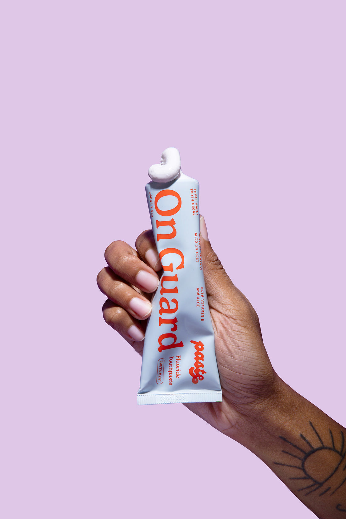 Paste fluoride toothpaste named On Guard. Helps restore vital minerals to weakened enamel. Promotes stronger, healthier teeth and supports overall oral resilience. Packed with essential minerals, it delivers comprehensive care for long-term dental strength and protection.