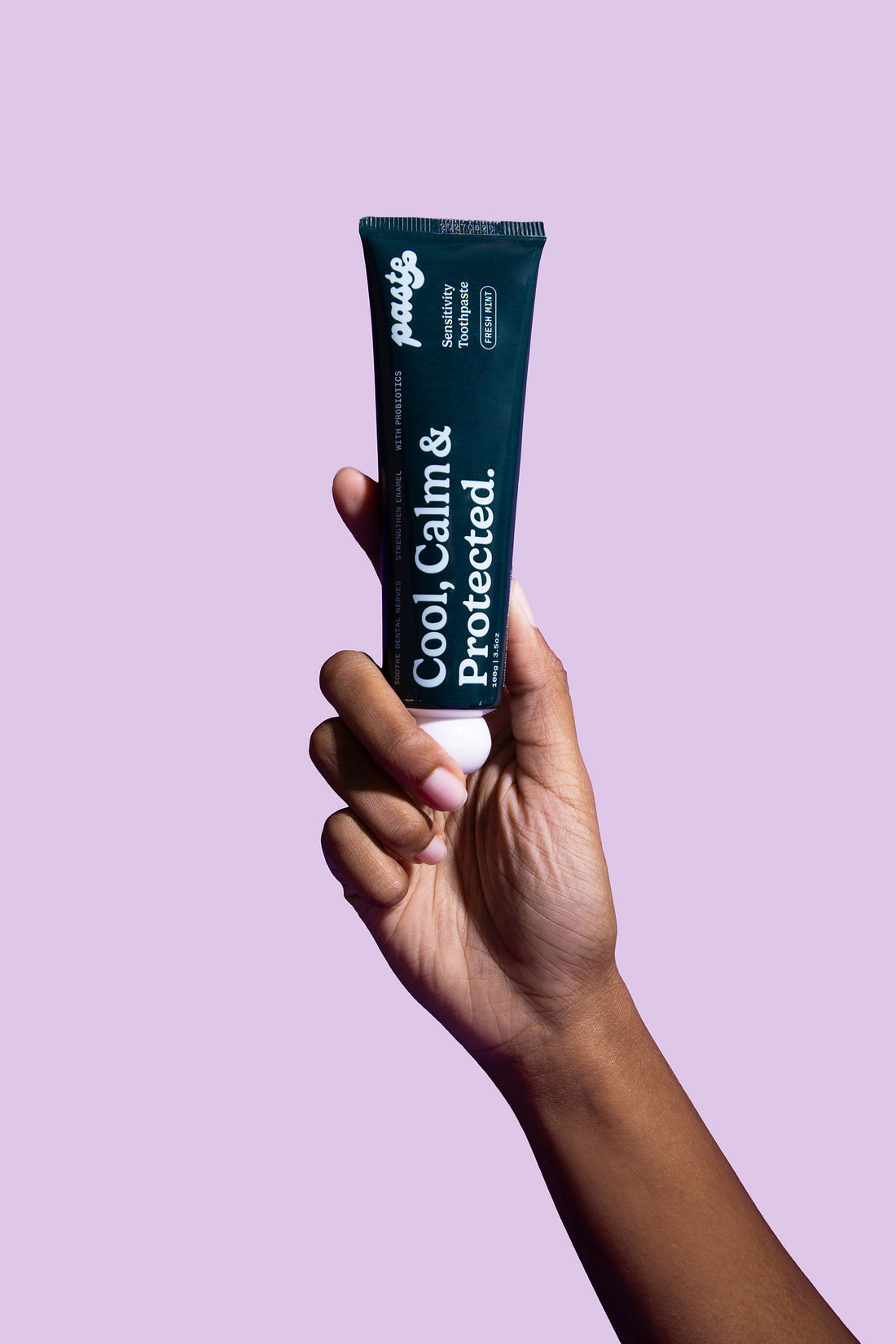 Paste anti-sensitivity toothpaste formulated to reduce tooth sensitivity by building a protective layer over vulnerable areas of enamel. Provides fast relief from discomfort caused by hot and cold sensations while gradually strengthening enamel with continued use, helping teeth become more resilient over time.